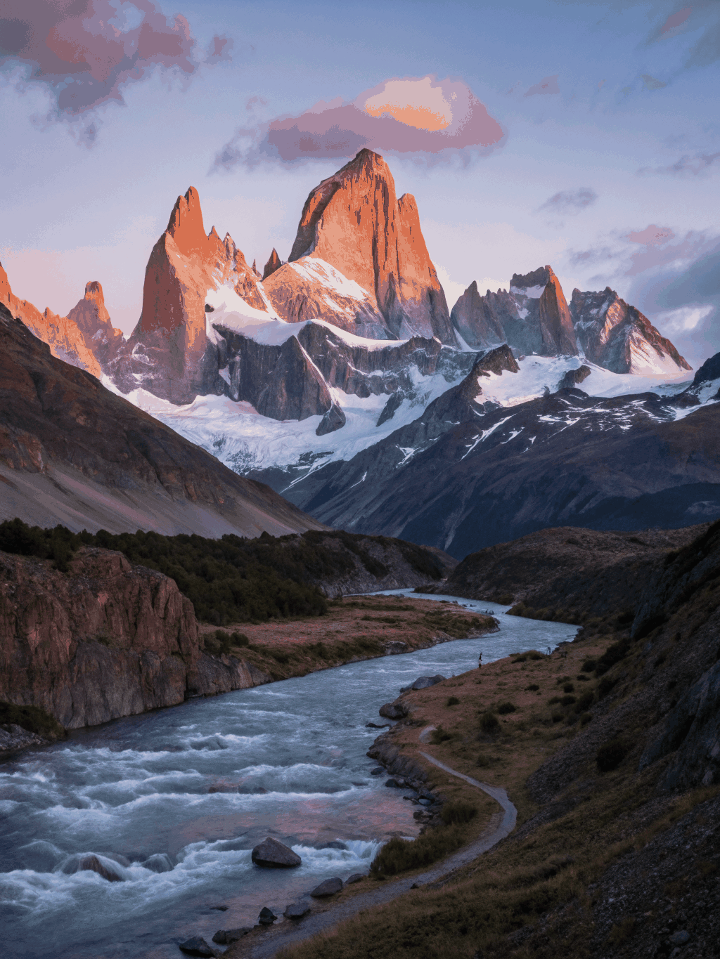 Granite peaks of Fitz Roy glowing in pink alpenglow